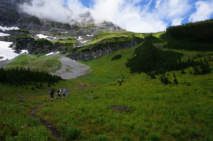 People on a hike in the Rocky Mountains, Alberta, Canada.